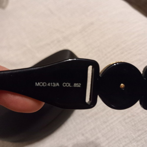 Versace sunglasses like new, vintage with gold decor