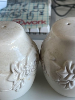 Vintage salt and pepper shakers with designs, 2 pieces like new