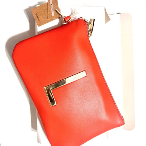 Carpisa orange handbag new with wristlet