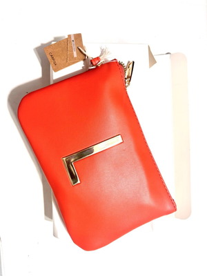 Carpisa orange handbag new with wristlet