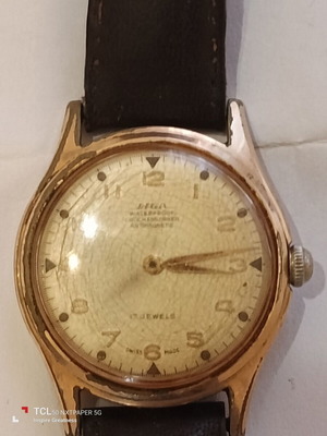 Liga Swiss watch used, manual wind, gold color, 1950-60