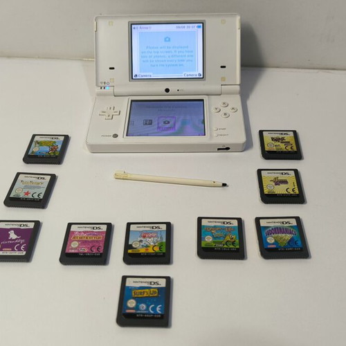 Nintendo DSi white console with 10 games and stylus used