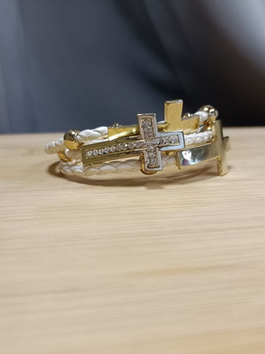 White and gold women's bracelet with rhinestones