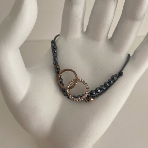 Gregio bracelet used, grey with rose gold charm