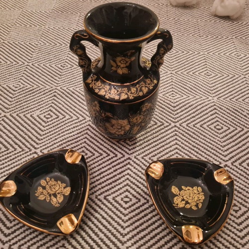 Vase and two ashtrays used, black porcelain with real gold, handmade