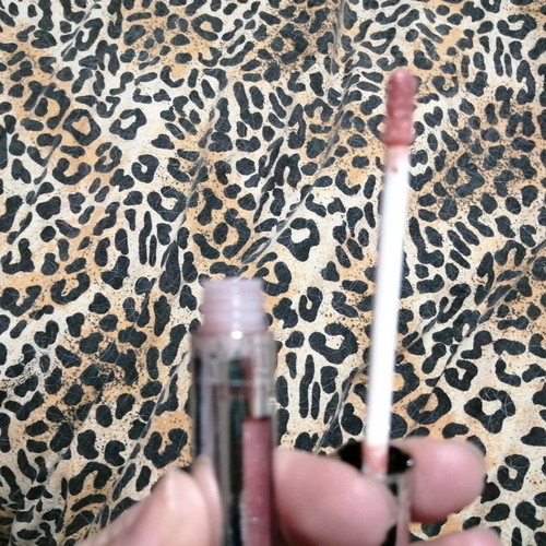 Dermacol lip gloss used, soft pink with shine