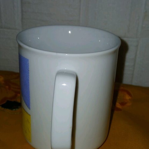 Mask mug used, rare 1980s with crack on handle