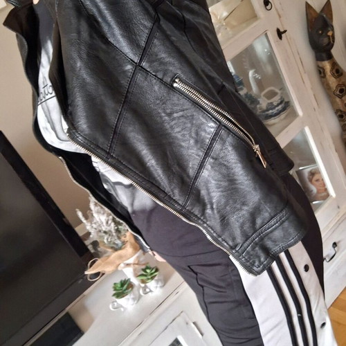 Women's black faux leather jacket with fur lining new