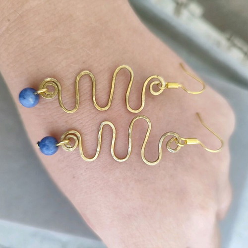 Chrysa earrings new, made of brass