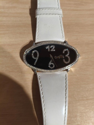 Ρολόι Oxette μεταχειρισμένο με αστραφτερά πετράδια, μαύρο και άσπρο