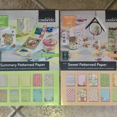 Patterned paper blocks like new, 2 packs with colorful designs