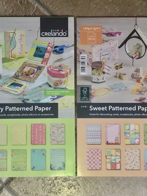 Patterned paper blocks like new, 2 packs with colorful designs