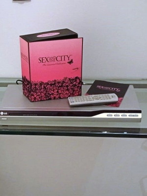 LG DVX276 Slim DVD Player used with Sex and the City box set