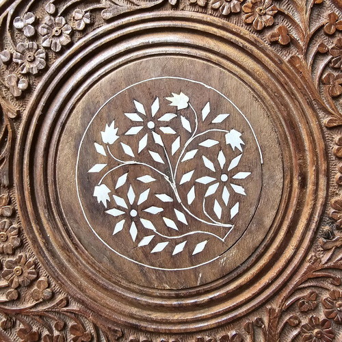 Carved coffee table used, 45cm height and 45cm diameter