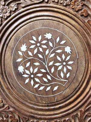 Carved coffee table used, 45cm height and 45cm diameter