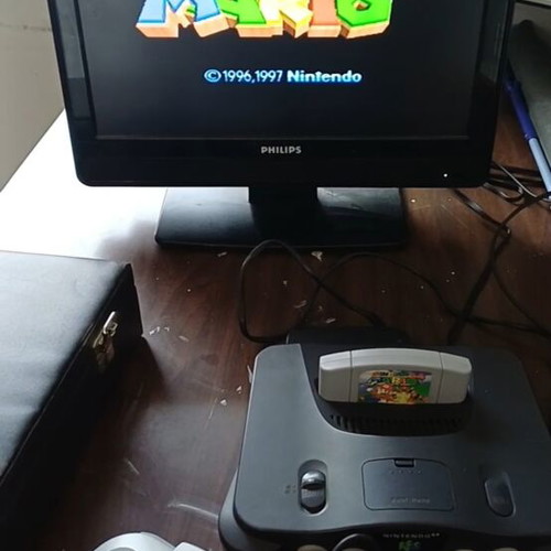 Nintendo 64 console with 2 games, 2 controllers and new video cable
