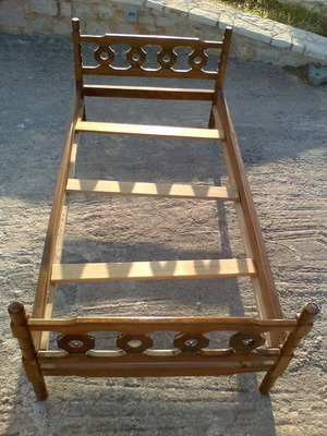 Wooden bed for one person used, good condition