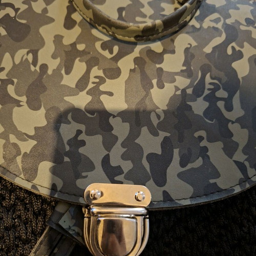 Knitted backpack like new with camo flap