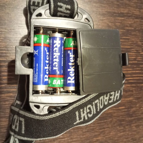 Headlamp like new, operates with 3 AA batteries