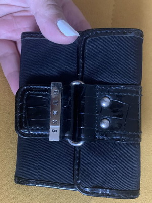 Guess wallet used, black canvas with faux croc details