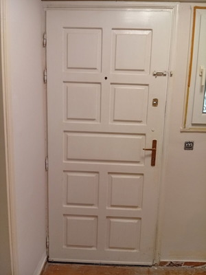 White wooden exterior door