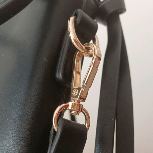 Duki Daso shoulder bag like new, black with gold details
