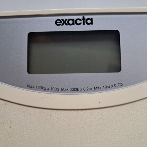 Exacta bathroom scale used, white color
