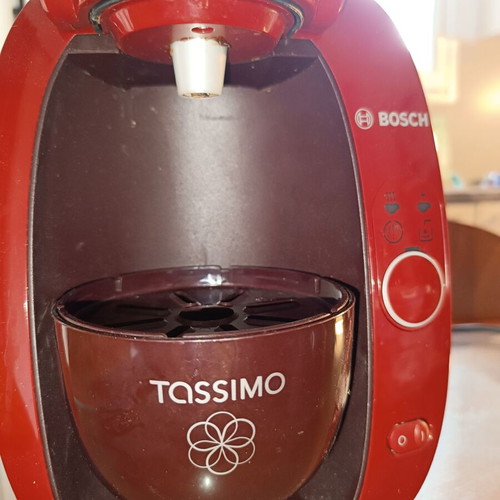 Tassimo coffee machine like new with capsules
