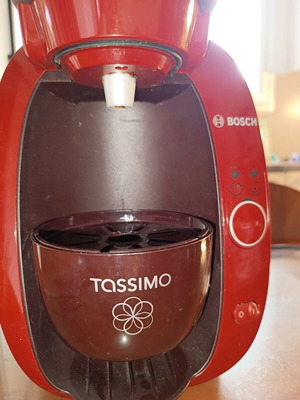 Tassimo coffee machine like new with capsules