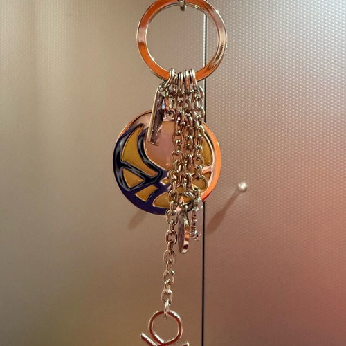 United Colors of Benetton silver keychain like new