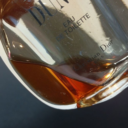 Dior Dune Eau de Toilette 50ml μεταχειρισμένο με ράγισμα και κολλημένο καπάκι