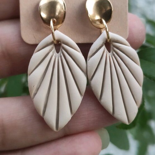 Earrings made of polymer clay and steel beige gold color