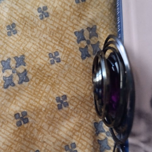 Pendant with long chain used, purple and mirror detail