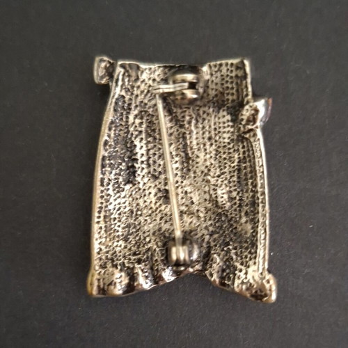 Vintage skirt-shaped brooch in silver metal with colorful rhinestones like new