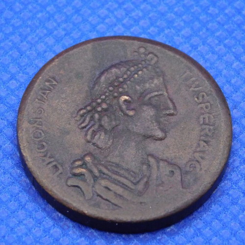 Decorative bronze medal with relief design