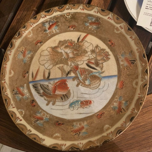 Chinese platter like new with golden embossed design