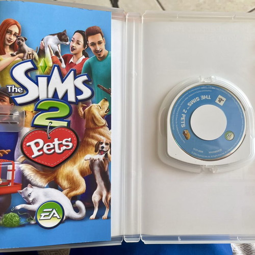 The Sims 2 Pets PSP game like new with case and manual