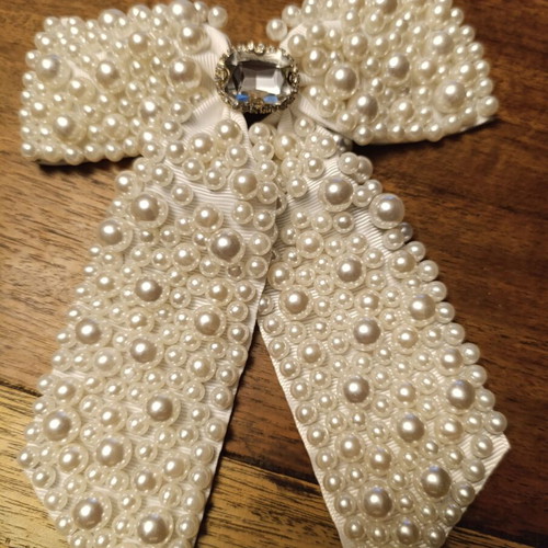 White hair bow with pearls and crystal