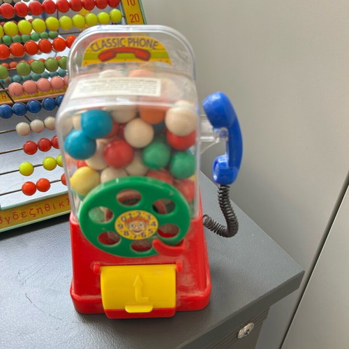 Vintage toys used, 1970s abacus counters, plastic phone