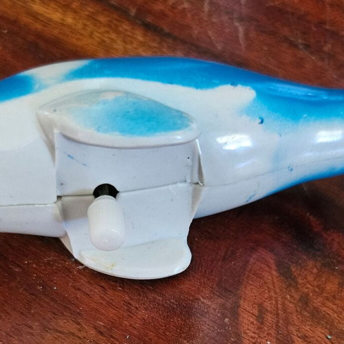 Wind-up dolphin toy like new