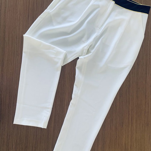 Stelios Koudounaris baggy fabric pants, ecru with black and yellow trim