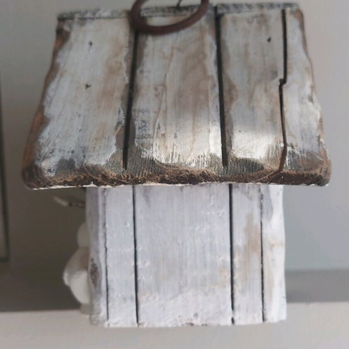 Wooden tabletop house used with ring for hanging