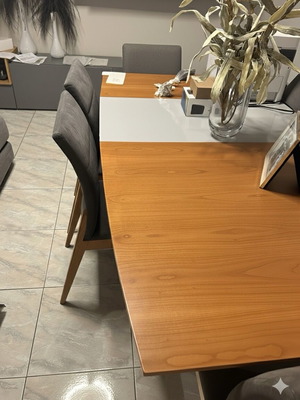 Solid wood dining table designed by Eleni Natsi