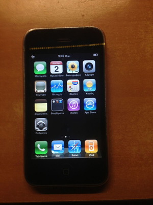 iPhone 3G 8GB used, black, with minor scratches and crack