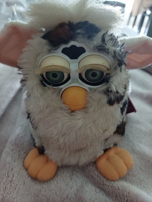 Furby Snow Leopard by Tiger Electronics, like new, collectible with green eyes