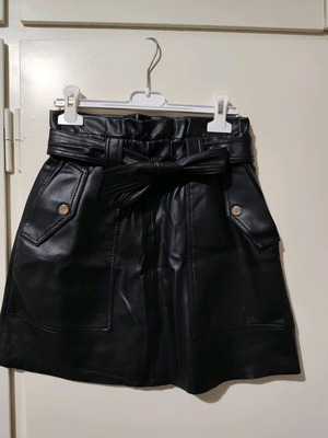 Zara black mini leatherette skirt used with belt and pockets