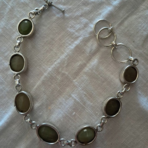 Silver bracelet with genuine green stones, like new
