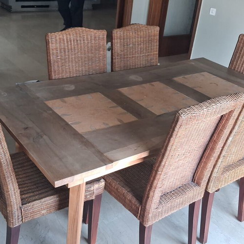 Vintage wooden dining set with rectangular table and six wicker chairs
