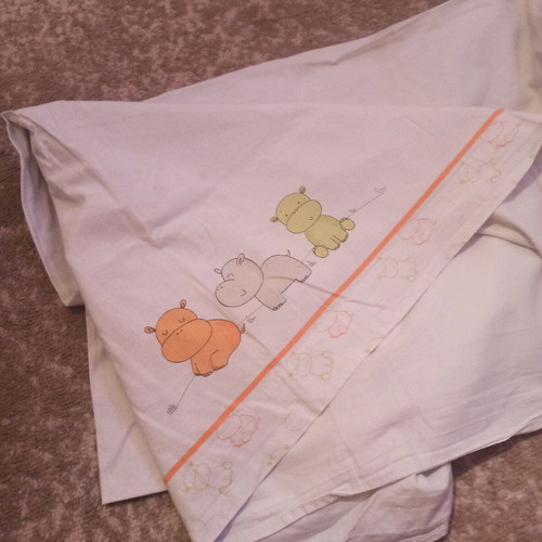 Baby crib sheet set like new with pillowcase and colorful hippos