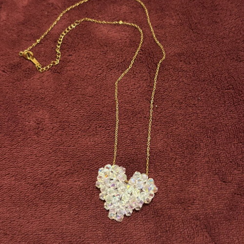 Gold necklace with crystal heart pendant